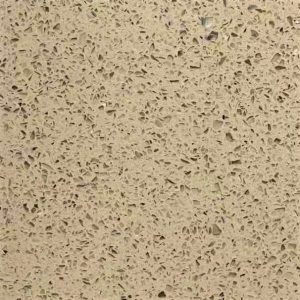 Beige quartz countertop with dark speckles and aggregate texture