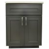 Dark gray bathroom vanity cabinet with two doors, silver handles, and a light countertop