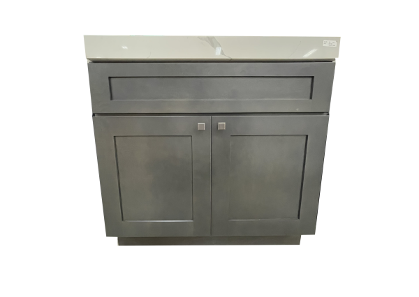 Gray bathroom vanity cabinet with two cabinet doors and one upper drawer with small square handles