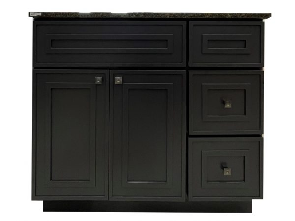 Black shaker-style bathroom vanity cabinet with dark granite countertop, featuring two drawers on top, two cabinet doors below, and three drawers on the right side with square nickel handles