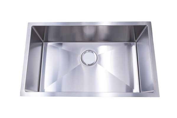 Stainless steel single bowl undermount kitchen sink with large rectangular basin, angled sidewalls, and center drain hole