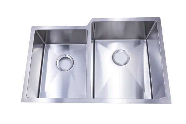 Stainless steel double basin undermount kitchen sink with two equal rectangular bowls and drain holes