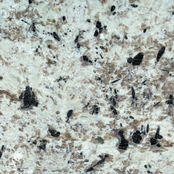 CT-249 Milky Way Galaxy Close-up of speckled granite countertop with white base, tan, and black mineral flecks