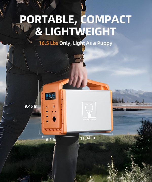 Portable orange and white power station weighing 16.5 lbs with dimensions 11.34 x 9.45 x 6.1 inches being held by a person outdoors near a lake with mountains in background