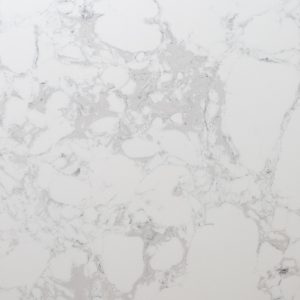 White marble with gray speckles and soft gray veining creating organic patterns