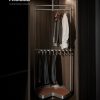 HIGOLD pull-out clothing rack system with hanging rod and hooks for garments inside a wooden wardrobe closet