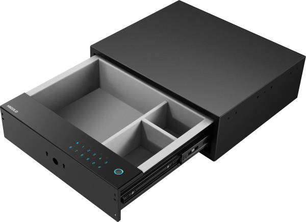 InSinkErator black drawer-style food waste disposal unit with open drawer showing gray compartments