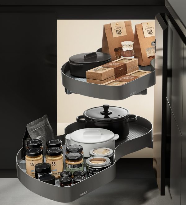 Two-tier rotating kitchen carousel organizer with cookware, storage jars, and food packaging