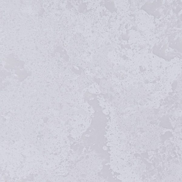 White textured surface with crystalline or grainy appearance and subtle variations