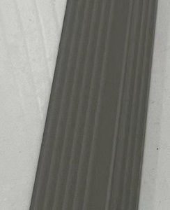 Dark gray composite fence panel with vertical ridged texture and metal corner bracket