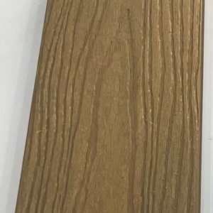 Close-up of light tan oak wood grain textured flooring sample with interlocking edge profile
