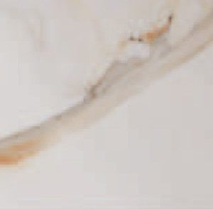 Beige and cream marble surface with warm golden and gray accent veins