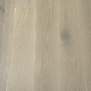 Light gray oak wood flooring with natural grain patterns and knots