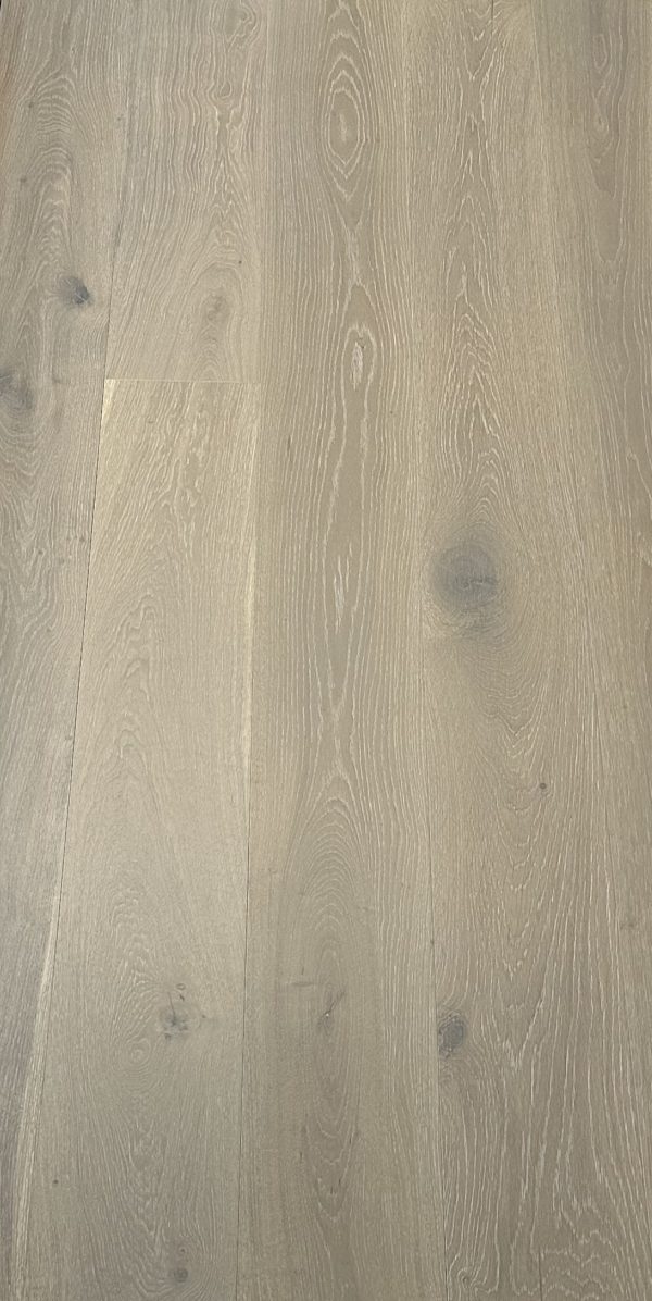 Light gray oak wood flooring with natural grain patterns and knots