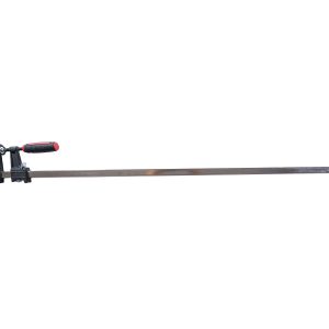 Heavy-duty bar clamp with black metal frame, red and black cushioned handle, and long steel bar for woodworking and construction
