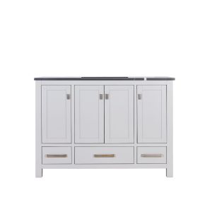 Light gray vanity cabinet with four cabinet doors on top and three drawers below with dark countertop