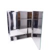Glass medicine cabinet with mirrored doors open displaying interior shelving and chrome hardware