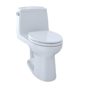 White one-piece toilet with closed lid and tank, viewed from angled side perspective