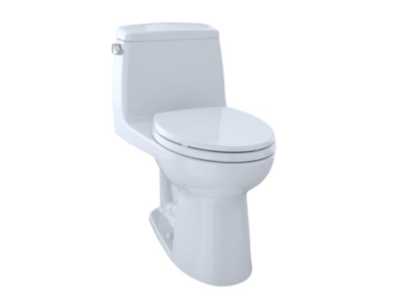 White one-piece toilet with closed lid and tank, viewed from angled side perspective