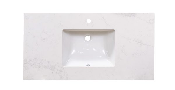 Calacatta marble countertop with centered white rectangular undermount sink and single faucet hole