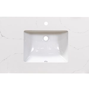 Carrara marble countertop with centered white rectangular sink cutout and single faucet hole