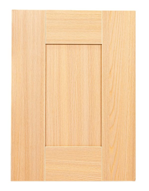 Light oak wood cabinet door front with inset panel design and natural grain finish