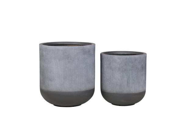 Two gray and black ribbed cylindrical planter pots in different sizes