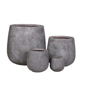 Set of four gray textured concrete round tapered planter pots in graduated sizes