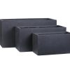 Set of three nested black rectangular concrete planter boxes