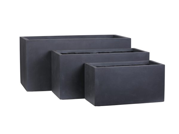 Set of three nested black rectangular concrete planter boxes