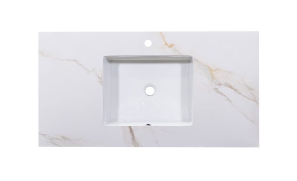 Single white rectangular undermount sink on white marble countertop with gold veining