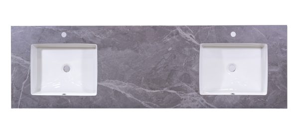 Dual white rectangular undermount bathroom sinks on gray marble countertop with wall-mounted faucet holes