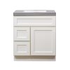 White bathroom vanity cabinet with gray countertop, one drawer and two cabinet doors with recessed panel styling