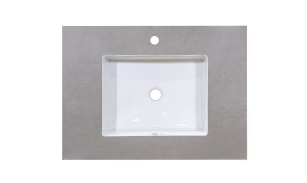 White rectangular bathroom sink with single faucet hole mounted on light gray concrete-look countertop