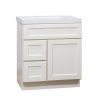 White bathroom vanity with white integrated sink, one top drawer and two lower cabinet doors with brushed nickel hardware