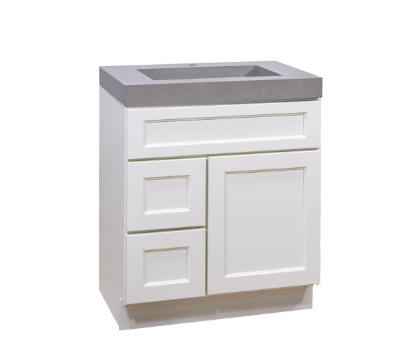 White bathroom vanity cabinet with gray concrete countertop and rectangular sink, showing two center doors and two left side drawers