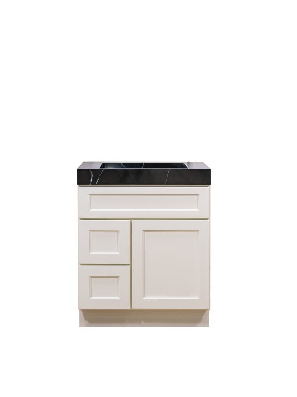 White bathroom vanity with black marble countertop, single door cabinet, and two left-side drawers
