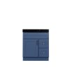 Blue-gray bathroom vanity with black marble countertop, single door cabinet, and two right-side drawers