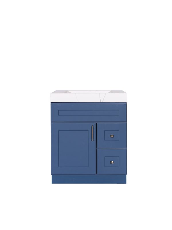 Blue bathroom vanity cabinet with single door, two drawers on right side, and white marble countertop