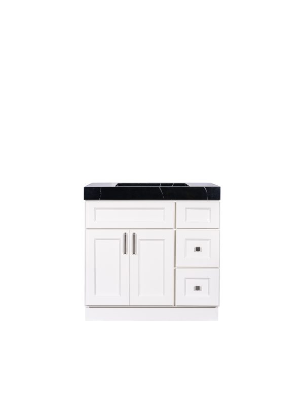 White bathroom vanity cabinet with black marble countertop, double doors, and right-side drawers