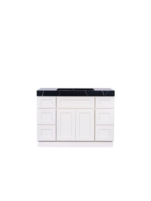 White shaker style bathroom vanity with black marble top and integrated sink, double door cabinet