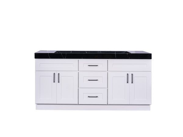 White double bathroom vanity with black marble countertop, dual cabinets with handles, and center drawers