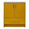 Golden yellow bathroom vanity with white marble countertop, two cabinet doors with black handles, and one drawer