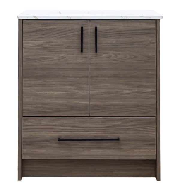 Dark wood bathroom vanity with white marble countertop, two cabinet doors with black handles, and one drawer