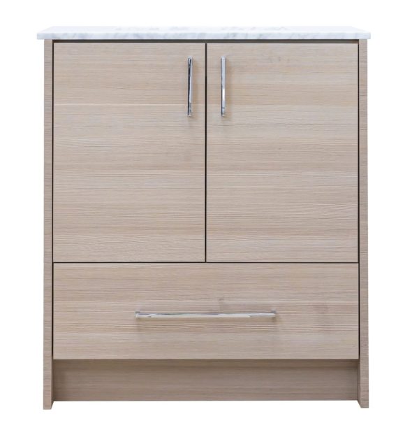 Light wood bathroom vanity with white marble countertop, two cabinet doors with chrome handles, and one drawer