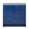 Modern navy blue high-gloss bathroom vanity with gray concrete countertop, two cabinet doors with brass handles, and one lower drawer