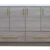 Gray wood bathroom vanity with 4 upper cabinet doors and 2 lower drawers, featuring brass handles and a white countertop