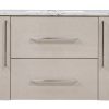 Beige linen bathroom vanity with marble countertop, two cabinet doors with gray vertical handles, and two center drawers with silver handles