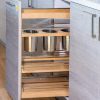 Tall pull-out wooden spice rack organizer with stainless steel containers and natural wood shelving