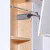 Interior of kitchen cabinet with wooden shelving and mounted paper towel holder on door